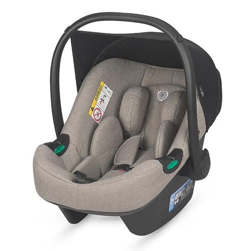 Kompatibler Autokindersitz in Beige als Teil des Kinderwagen-Reisesystems.